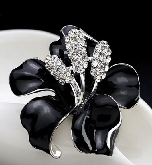 Black flowers brooch
