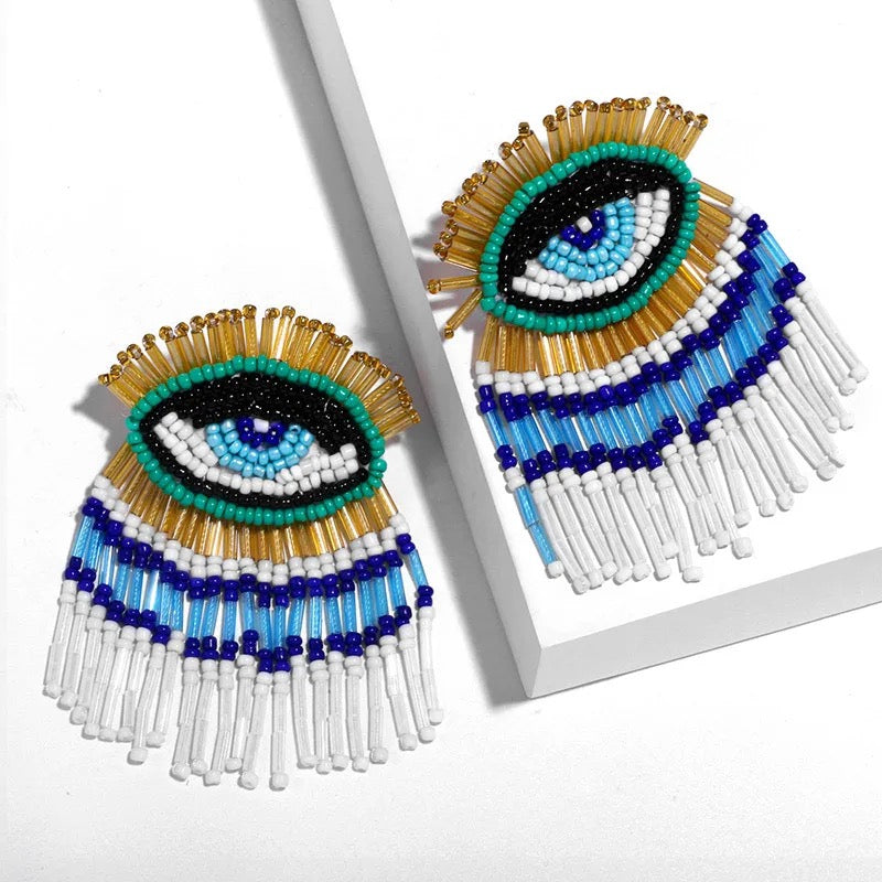 Green evil earrings